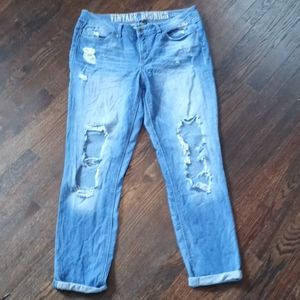 Cropped distressed ripped jeans